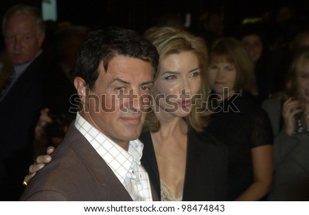 Actor SYLVESTER STALLONE & wife JENNIFER FLAVIN at the National Multiple Sclerosis Society's 29th Annual Dinner of Champions honoring Bob and Harvey Weinstein. Sept 25, 2003  Paul Smith / Featureflash
