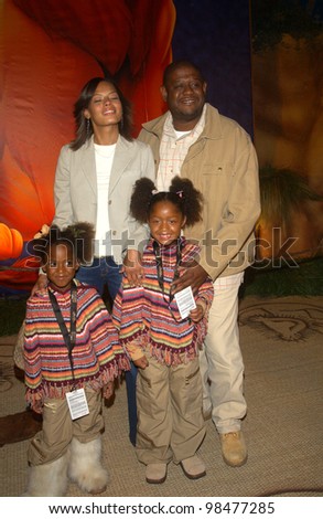 Actor FOREST WHITAKER & family at the Hollywood premiere for The Lion King Special Edition DVD. Oct 3, 2003  Paul Smith / Featureflash