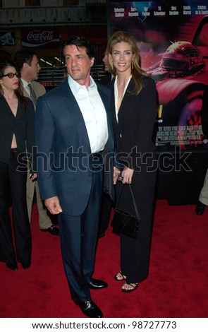 Actor SYLVESTER STALLONE & model wife JENNIFER FLAVIN at the premiere of his new movie Driven, at Manns Chinese Theatre, Hollywood. 16APR2001.    Paul Smith/Featureflash