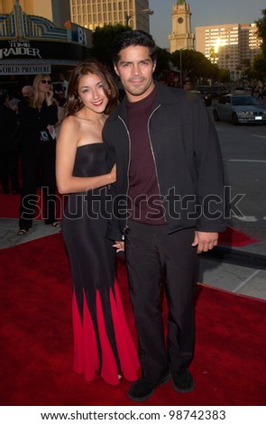 Actor ESAI MORALES & date at the world premiere, in Los Angeles, of Lara Croft: Tomb Raider. 11JUN2001.    Paul Smith/Featureflash