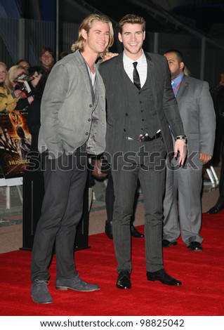Chris and Liam Hemsworth arriving at the European Premiere of \'The Hunger Games\' at the O2 Arena, London. 14/03/2012 Picture by: Alexandra Glen / Featureflash