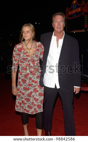 Actor BRYAN BROWN & daughter MATHILDA at the world premiere, in Hollywood, of his new movie Along Came Polly. January 12, 2004