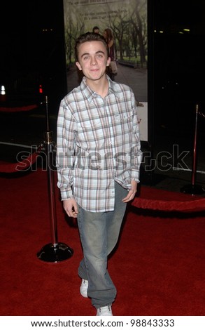 Actor FRANKIE MUNIZ at the world premiere, in Hollywood, of Along Came Polly. January 12, 2004