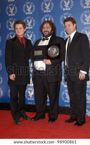Best Feature Film Director winner PETER JACKSON with actors ELIJAH WOOD (left) & SEAN ASTIN at the 56th Annual Directors Guild Awards in Century City, Los Angeles, CA. February 7, 2004