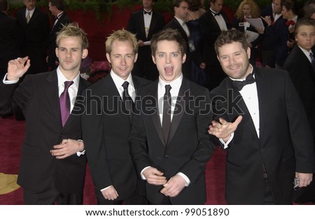 DOMINIC MONAGHAN (left), BILLY BOYD, ELIJAH WOOD & SEAN ASTIN at the 76th Annual Academy Awards in Hollywood. February 29, 2004