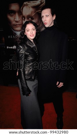 17NOV99:  Rock star MARILYN MANSON & actress girlfriend ROSE McGOWAN at the world premiere, in Hollywood, of  \