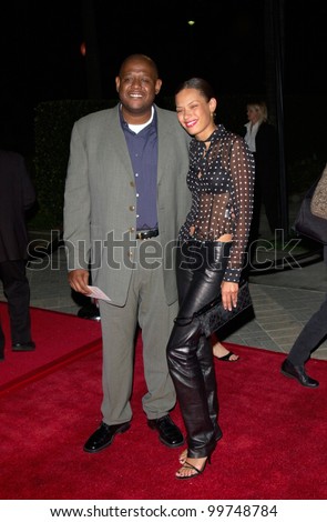 Actor FOREST WHITAKER & wife at the world premiere, in Los Angeles, of Lucky Numbers. 24OCT2000.   Paul Smith / Featureflash