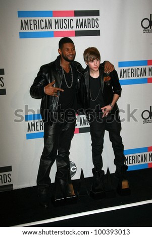 Usher, Justin Bieber at the 2010 American Music Awards Press Room, Nokia Theater, Los Angeles, CA. 11-21-10