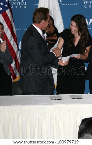 Arnold Schwarzenegger, Julia Ormond at the Official Signing of California Senate Bill 657, Museum Of Tolerance, Los Angeles, CA. 10-18-10