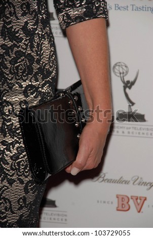 Elizabeth Perkins\'s purse at the Academy of Television Arts and Sciences Prime Time Emmy Nominees Party. Wolfgang Puck Pacific Design Center, West Hollywood, CA. 09-17-09