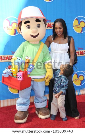 Angela Bassett and son Slater at the Los Angeles Premiere of \'Handy Manny Motorcycle Adventure\'. Arclight Hollywood, Hollywood, CA. 09-26-09