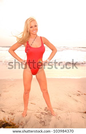 Katie Lohmann on Halloween, wearing an authentic Baywatch swimsuit from the TV series, Zuma Beach, CA. 10-31-09