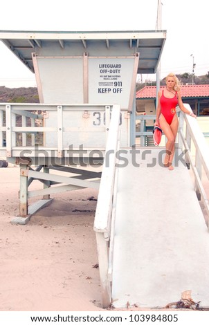 Katie Lohmann on Halloween, wearing an authentic Baywatch swimsuit from the TV series, Zuma Beach, CA. 10-31-09