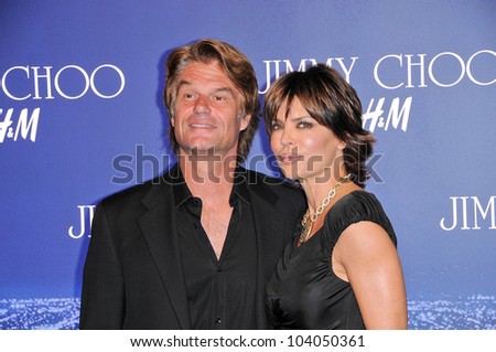 Harry Hamlin and Lisa Rinna at the Jimmy Choo For H&M Collection, Private Location, Los Angeles, CA. 11-02-09