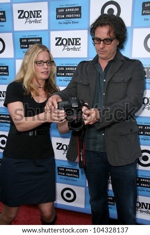 Elisabeth Shue and Davis Guggenheim at the Los Angeles Premiere of \'It Might Get Loud\'. Manns Festival Theatre, Westwood, CA. 06-19-09