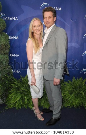 Anne Heche and James Tupper at Oceana\'s SeaChange Summer Party 2009. Private Residence, Laguna Beach, CA. 08-22-09