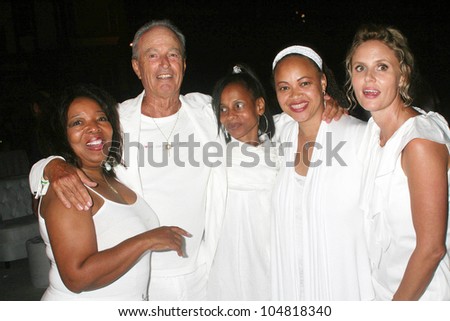 Fred Segal and Tina Segal with guests  at the Birthday Celebration for Fred Segal and Charity Auction. Private Location, Malibu, CA. 08-29-09