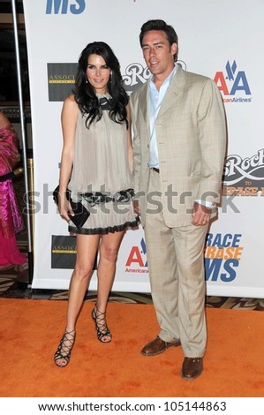 Angie Harmon and Jason Sehorn at the 16th Annual Race To Erase MS Gala \'Rock To Erase MS\'. Hyatt Regency Century Plaza, Century City, CA. 05-08-09