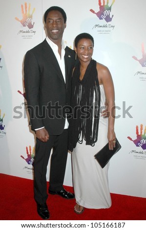 Isaiah Washington and wife Jenisa  at the Launch of \'Mandela Day\'. Beverly Hills Hotel, Beverly Hills, CA. 05-14-09