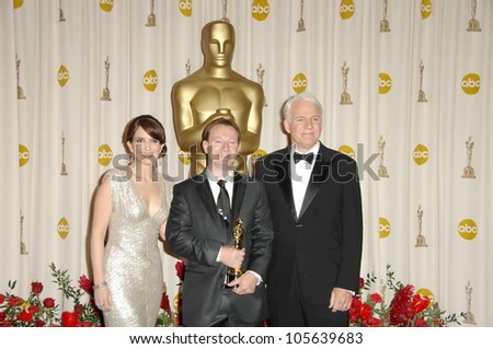 Tina Fey with Simon Beaufoy and Steve Martin in the Press Room at the 81st Annual Academy Awards. Kodak Theatre, Hollywood, CA. 02-22-09