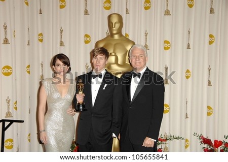 Tina Fey with Dustin Lance Black and Steve Martin  in the Press Room at the 81st Annual Academy Awards. Kodak Theatre, Hollywood, CA. 02-22-09
