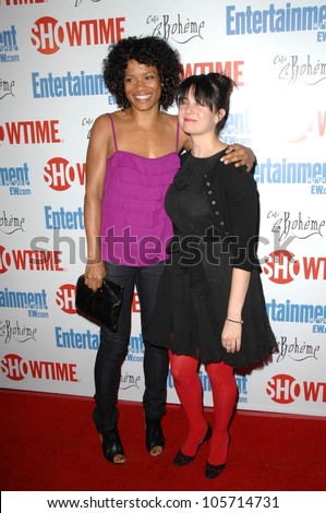 Rose Rollins and Mia Kirshner  at the farewell party for final season of \'The L Word\'. Cafe La Boheme, West Hollywood, CA. 03-03-09