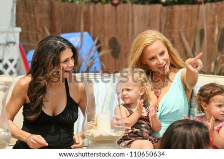 Samantha Harris with Cindy Margolis and family at the Hot Moms Video Shoot for \