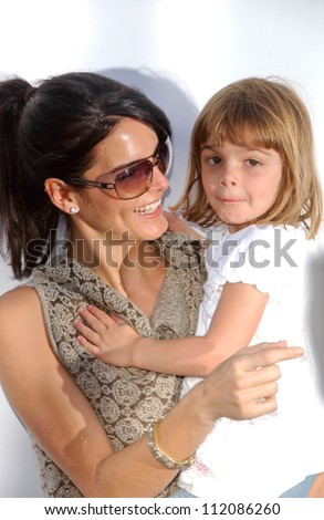Angie Harmon and daughter Avery at the John Varvatos 5th Annual Stuart House Benefit. John Varvatos Boutique, West Hollywood, CA. 03-11-07