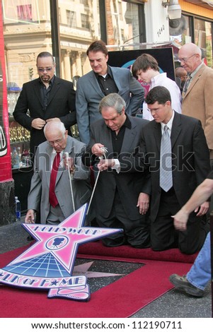 Johnny Grant with Dick Wolf and friends at the ceremony honoring Dick Wolf with the 2,332nd star on the Hollywood Walk of Fame. Hollywood Boulevard, Hollywood, CA. 03-29-07