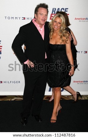 Tom Arnold and wife Shelby at the 14th Annual \