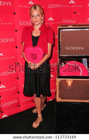 Sienna Miller at the Press Conference for Godiva\'s Hearts on Fire Diamond Shopping Spree. Godiva Boutique, Century City, CA. 01-10-06
