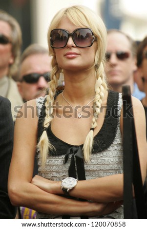 Paris Hilton at the Ceremony Honoring Los Angeles Lakers Owner Jerry Buss with the 2,323rd star on the Hollywood Walk of Fame. Hollywood Boulevard, Hollywood, CA. 10-30-06