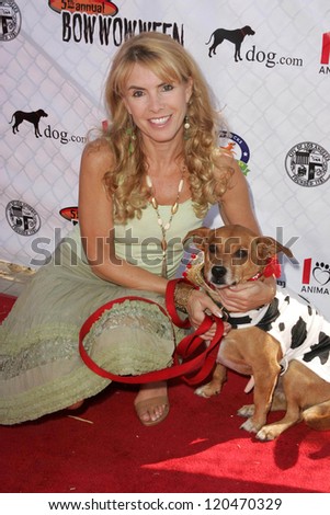 Julia Verdin and her dog Spanner at The 5th Annual BowWowWeen Benefit Presented by Dog.com. Barrington Dog Park, Los Angeles, CA. 10-29-06