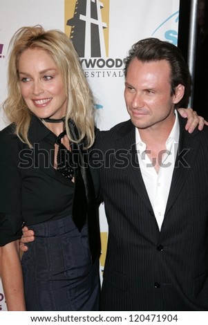 Sharon Stone and Christian Slater at the Hollywood Film Festival's 10th Annual Hollywood Awards Gala. Beverly Hilton Hotel, Beverly Hills, CA. 10-23-06