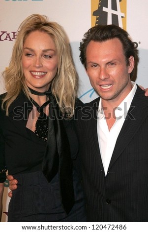 Sharon Stone and Christian Slater at the Hollywood Film Festival\'s 10th Annual Hollywood Awards Gala. Beverly Hilton Hotel, Beverly Hills, CA. 10-23-06