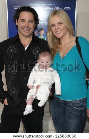 Jonathan Baker and Victoria Fuller with daughter Trease at the premiere of \