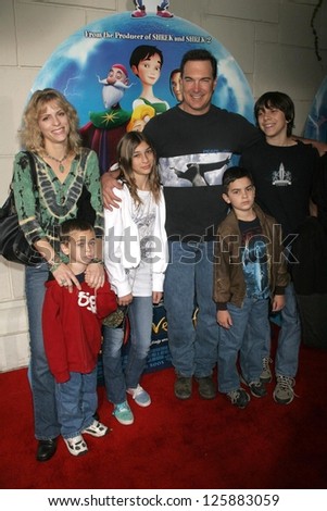 Patrick Warburton and family at the premiere of \