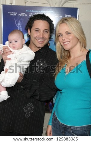 Jonathan Baker and Victoria Fuller with daughter Trease at the premiere of \