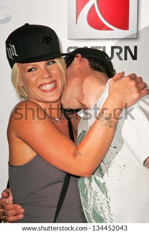 HOLLYWOOD - AUGUST 02: Pink and Carey Hart at Saturn\'s X-Games 12 Party at 6820 Hollywood Blvd on August 02, 2006 in Hollywood, CA.