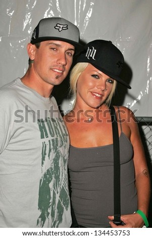 HOLLYWOOD - AUGUST 02: Pink and Carey Hart at Saturn's X-Games 12 Party at 6820 Hollywood Blvd on August 02, 2006 in Hollywood, CA.
