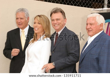 HOLLYWOOD - APRIL 20: Alex Trebek and Vanna White with Merv Griffin and Pat Sajak at the Ceremony honoring Vanna White with a star on the Hollywood Walk of Fame on April 20, 2006 in Hollywood, CA.