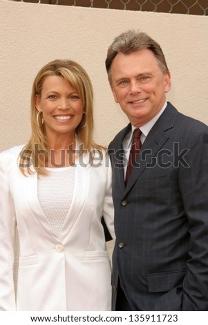 HOLLYWOOD - APRIL 20: Pat Sajak and Vanna White at the Ceremony honoring Vanna White with a star on the Hollywood Walk of Fame at Hollywood Boulevard on April 20, 2006 in Hollywood, CA.