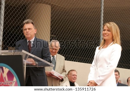 HOLLYWOOD - APRIL 20: Pat Sajak and Vanna White at the Ceremony honoring Vanna White with a star on the Hollywood Walk of Fame at Hollywood Boulevard on April 20, 2006 in Hollywood, CA.