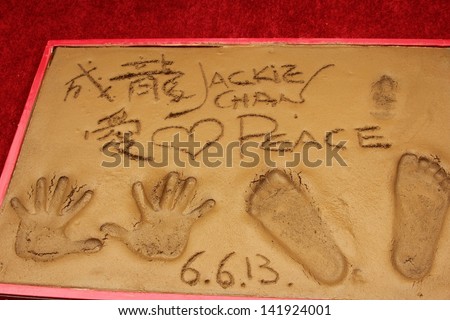 Close-up of Jackie Chan`s hand and foot print  at the Jackie Chan Hand and Foot Print Ceremony, TCL Chinese Theater, Hollywood, CA 06-06-13