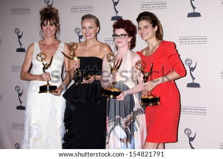Erinn Hayes, Malin Akerman, Megan Mullally, Lake Bell at the Primetime Creative Arts Emmy Awards 2013 Press Room, Nokia Theater, Los Angeles, CA 09-15-13