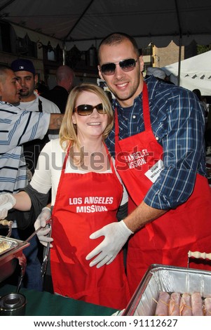 Melissa Joan Hart and Mark Wilkerson at the Los Angeles Mission\'s Christmas Eve Dinner for the Homeless. Los Angeles Mission, Los Angeles, CA. 12-24-07