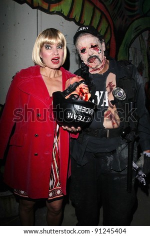 Rena Riffel and zombie friend at the Long Berach Zonie Walk after-party where Rena Riffel was judge of the \