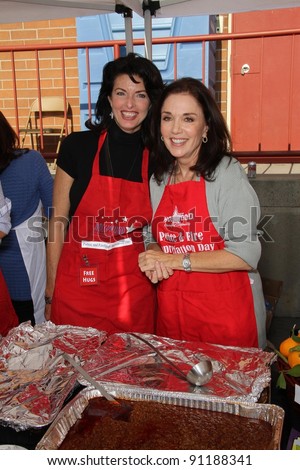 Joan Severence and Stepfanie Kramer at the Hollywood Chamber Of Commerce 17th Annual Police And Fire BBQ, Private Location, Hollywood, CA 11-30-11