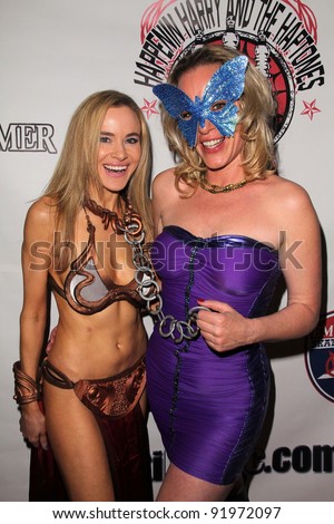 Paula Labaredas and Jenny McShane at the Vera Mesmer Video Release Party, featuring Harry The Dog and Paula Labareas of ComicCosplay, Aqua Lounge, Beverly Hills, CA. 03-09-11