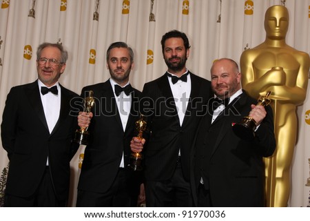 Steven Spielberg, Emile Sherman, Iain Canning and Gareth Unwin at the 83rd Annual Academy Awards Press Room, Kodak Theater, Hollywood, CA. 02-27-11